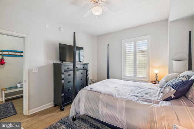 105 56th Unit 210P1, Ocean City, MD 21842 - bedroom with light wood-type flooring, baseboards, and ceiling fan