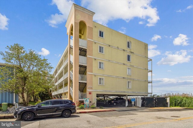 105 56th Unit 210P1, Ocean City, MD 21842 - view of building exterior with covered parking
