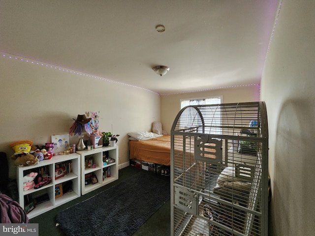 703 Beaverbrook Rd, Baltimore, MD 21212 - bedroom with baseboards and carpet