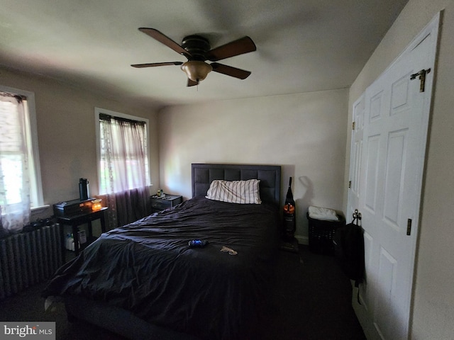 703 Beaverbrook Rd, Baltimore, MD 21212 - bedroom featuring radiator heating unit and a ceiling fan