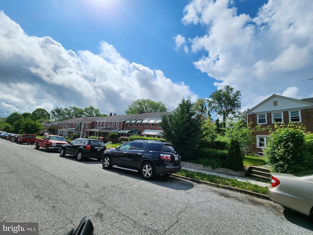 view of parking / parking lot with a residential view