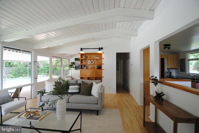 7807 Sycamore Dr, Falls Church, VA 22042 - living area featuring wooden ceiling, light wood finished floors, and baseboards