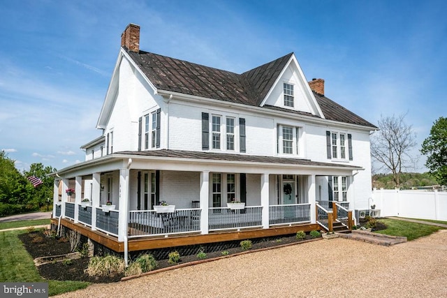 644 Early Dr, Broadway, VA 22815 - farmhouse featuring a chimney, a porch, and brick siding