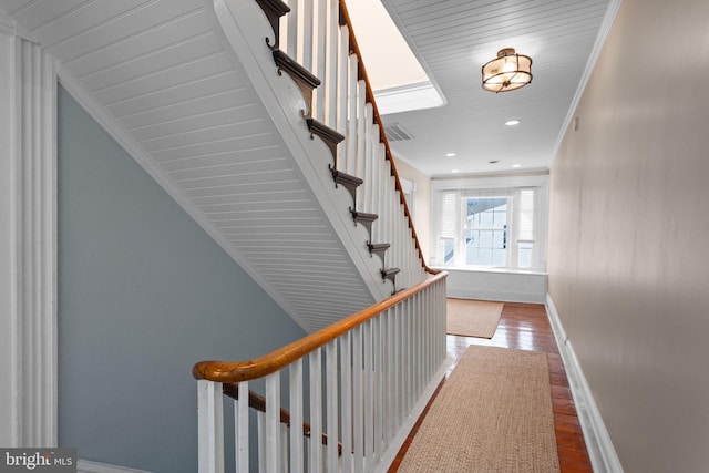 644 Early Dr, Broadway, VA 22815 - hallway featuring baseboards, wood finished floors, stairs, recessed lighting, and ornamental molding