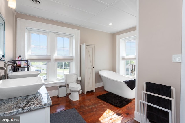 644 Early Dr, Broadway, VA 22815 - full bath with hardwood / wood-style flooring, baseboards, a soaking tub, plenty of natural light, and recessed lighting