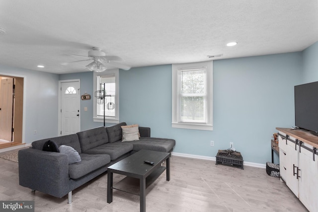 644 Early Dr, Broadway, VA 22815 - living room with plenty of natural light, baseboards, a ceiling fan, a textured ceiling, and recessed lighting