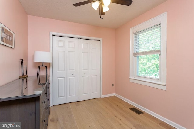 644 Early Dr, Broadway, VA 22815 - unfurnished bedroom featuring light wood-type flooring, baseboards, a closet, and ceiling fan