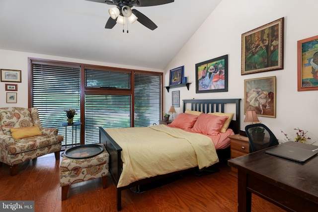 bedroom with lofted ceiling, wood finished floors, and ceiling fan