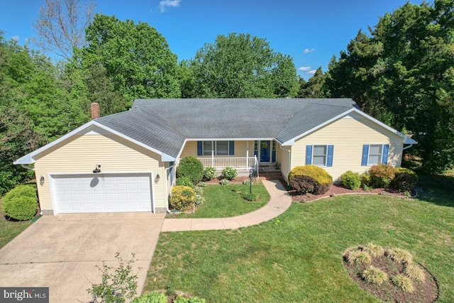 ranch-style home with a porch, driveway, a garage, and a front lawn
