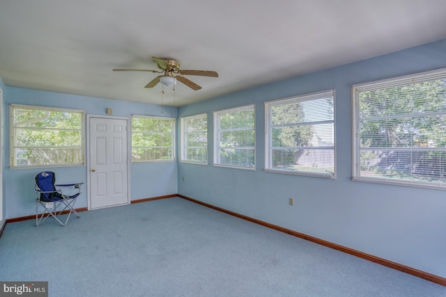 unfurnished sunroom featuring plenty of natural light