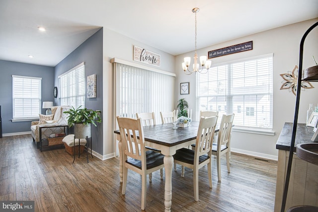 1143 Kayla Ln, Townsend, DE 19734 - dining room with wood finished floors, plenty of natural light, a chandelier, baseboards, and recessed lighting