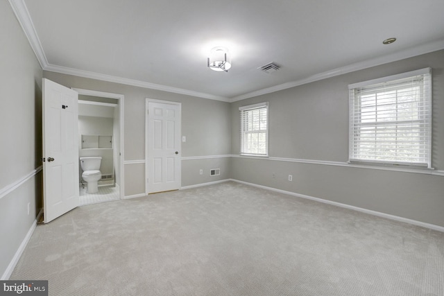 10013 Ormond Rd, Potomac, MD 20854 - unfurnished bedroom featuring crown molding, light colored carpet, baseboards, and ensuite bathroom