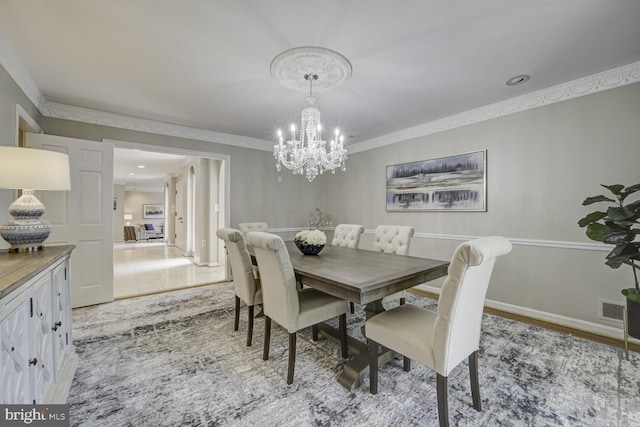 10013 Ormond Rd, Potomac, MD 20854 - dining space with a chandelier and crown molding