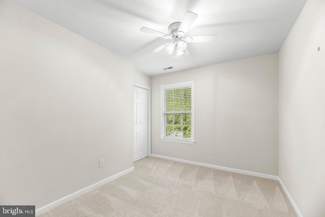 11874 Highview Cir, Lusby, MD 20657 - empty room featuring baseboards, carpet flooring, and ceiling fan