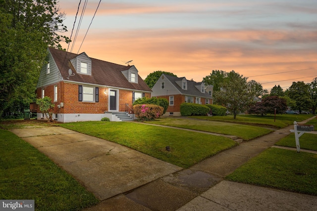 3531 Milford Mill Rd, Baltimore, MD 21244 - cape cod home with brick siding and a lawn
