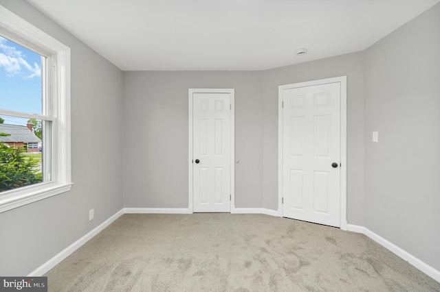 3531 Milford Mill Rd, Baltimore, MD 21244 - unfurnished bedroom with carpet flooring and baseboards