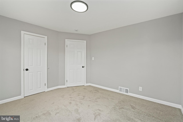 3531 Milford Mill Rd, Baltimore, MD 21244 - unfurnished bedroom with carpet flooring and baseboards
