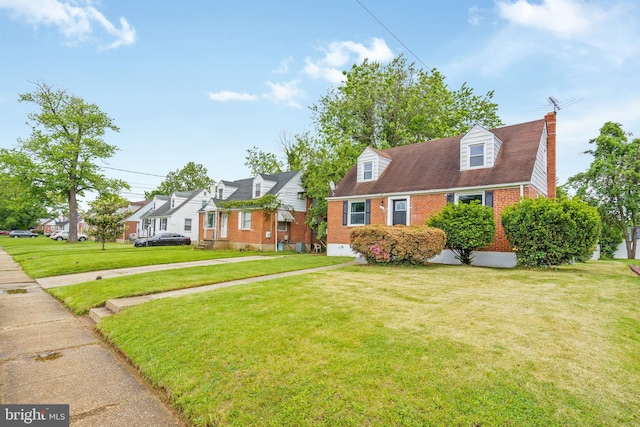 3531 Milford Mill Rd, Baltimore, MD 21244 - new england style home with brick siding, a chimney, and a front yard