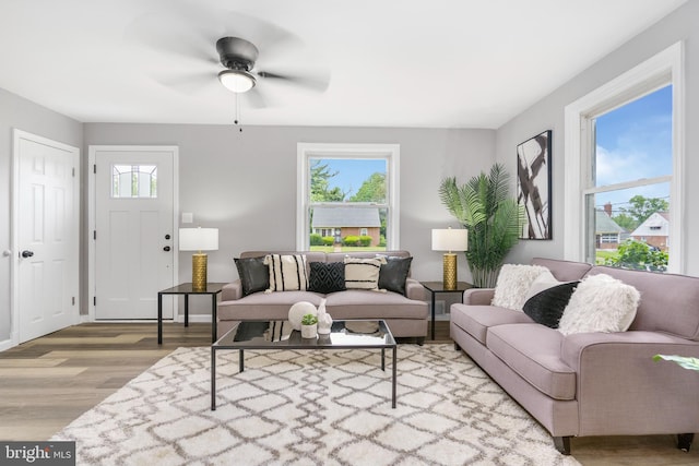 3531 Milford Mill Rd, Baltimore, MD 21244 - living area with wood finished floors and ceiling fan