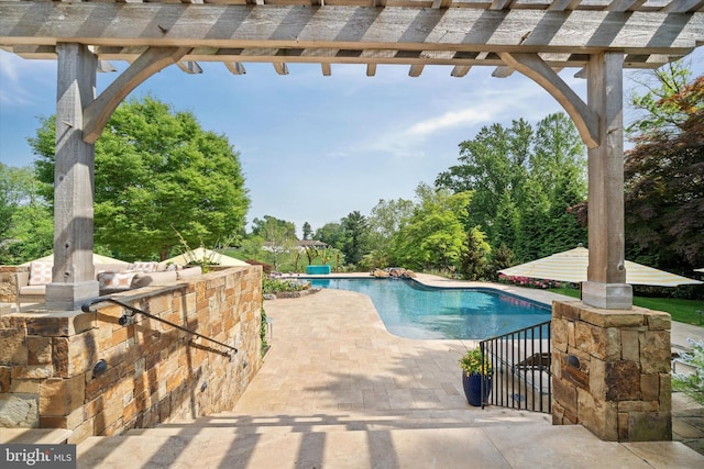 101 Greenspring Rd, Wilmington, DE 19807 - outdoor pool with a patio and view of wooded area