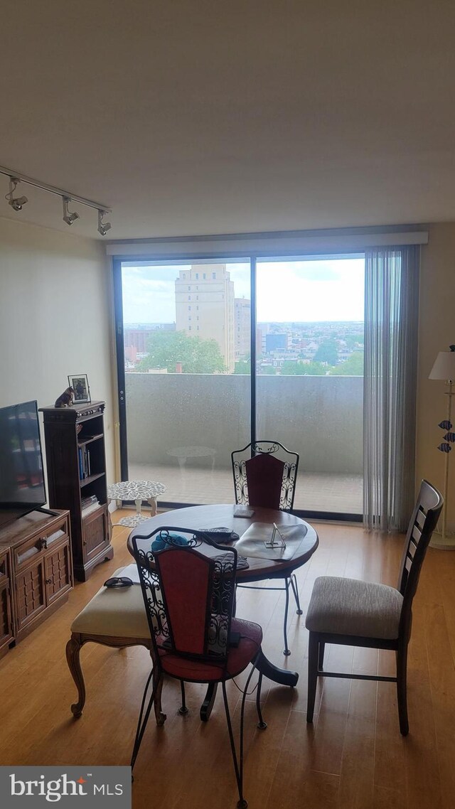 224-30 W Rittenhouse Unit 1108, Philadelphia, PA 19103 - dining area featuring wood finished floors and rail lighting