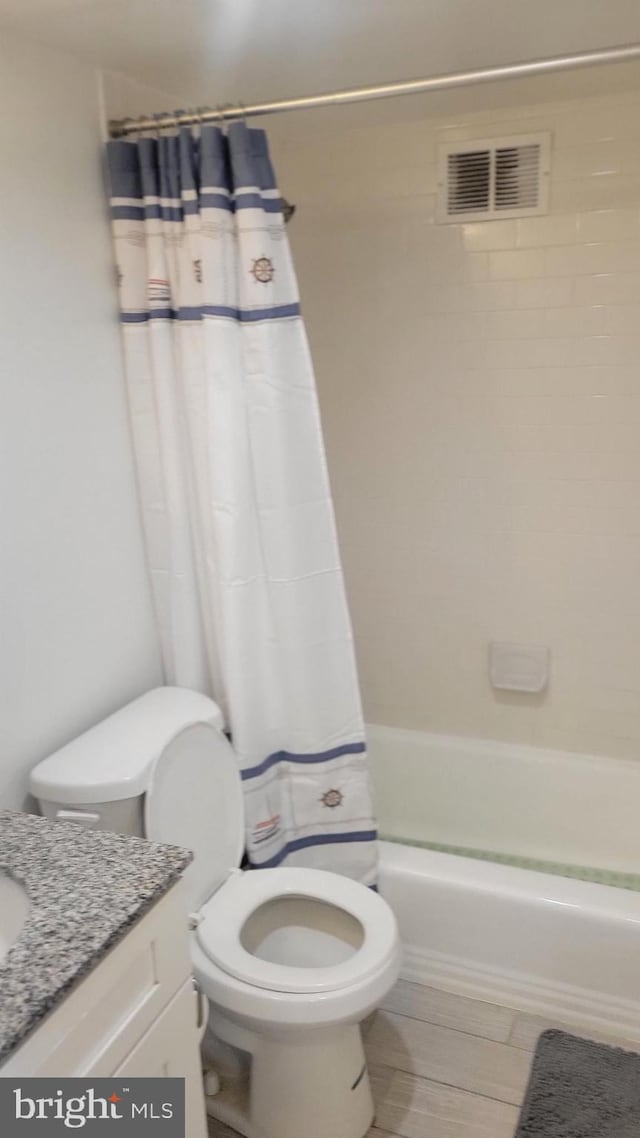 224-30 W Rittenhouse Unit 1108, Philadelphia, PA 19103 - full bath featuring toilet, vanity, and shower / bath combo with shower curtain