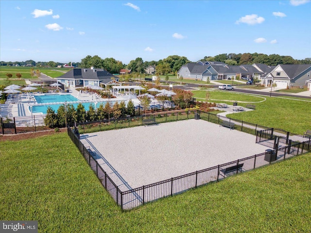 view of property's community featuring a residential view and a pool