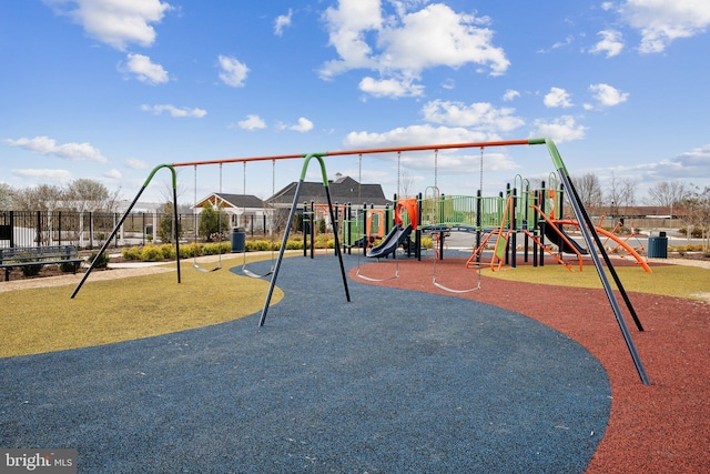community jungle gym with fence