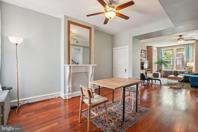 915 Westminster St NW, Washington, DC 20001 - dining space with ceiling fan, radiator, and wood finished floors