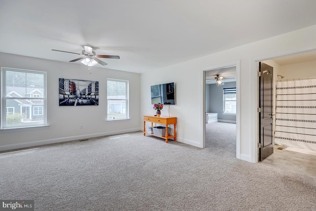 22378 Mahogany Rd, Milton, DE 19968 - carpeted living room with ceiling fan, healthy amount of natural light, and baseboards