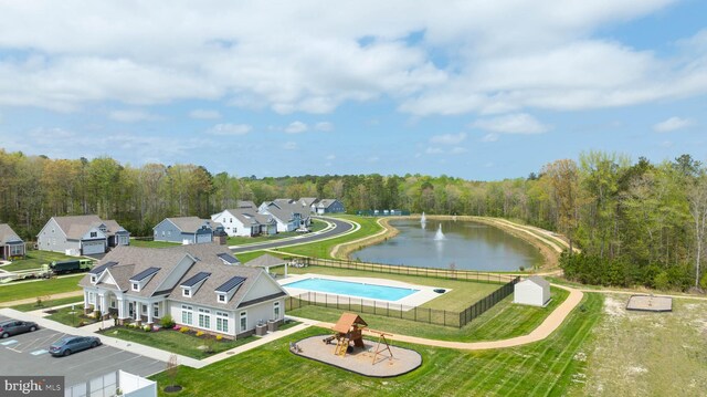 22378 Mahogany Rd, Milton, DE 19968 - bird's eye view of a nearby body of water, a pool, and a forest