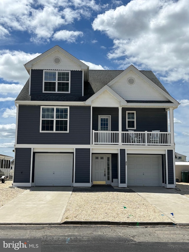 43 W Susquehanna Dr, Little Egg Harbor Twp, NJ 08087 - beach home with concrete driveway, a balcony, an attached garage, and a shingled roof