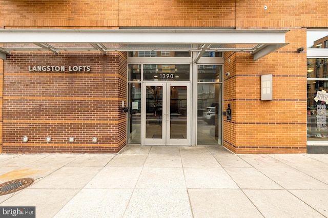 1390 V St NW Unit 309, Washington, DC 20009 - property entrance featuring french doors and brick siding