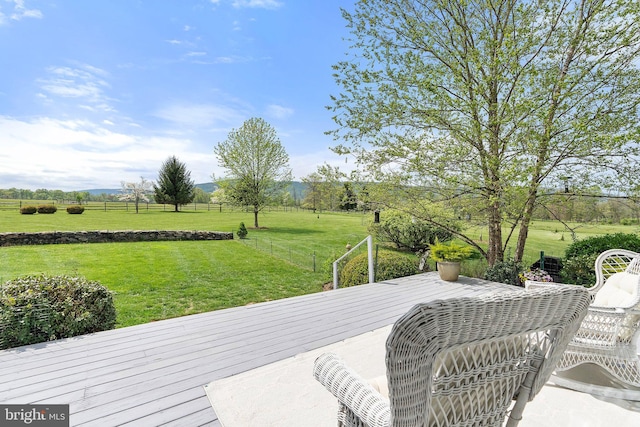 wooden deck featuring a view of rural / pastoral area