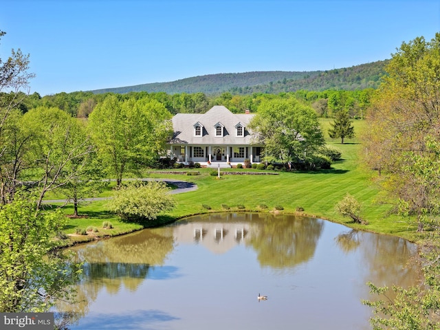 water view with a heavily wooded area