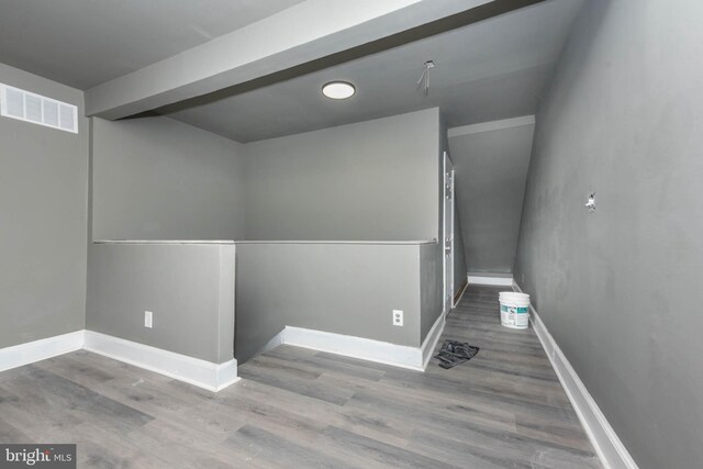 1412 W Baltimore St, Baltimore, MD 21223 - spare room featuring wood finished floors and baseboards