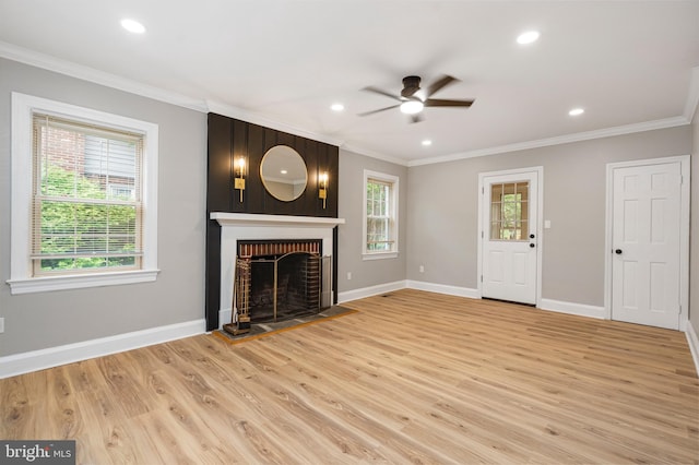 5311 Herring Run Dr, Baltimore, MD 21214 - unfurnished living room with ceiling fan, light wood-type flooring, a brick fireplace, baseboards, and ornamental molding