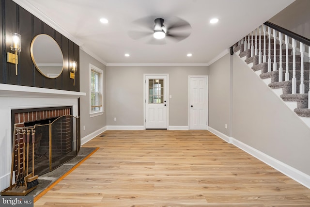 5311 Herring Run Dr, Baltimore, MD 21214 - foyer featuring ceiling fan, light wood-style floors, ornamental molding, stairs, and baseboards
