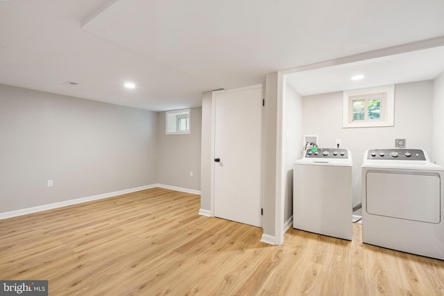 5311 Herring Run Dr, Baltimore, MD 21214 - laundry area featuring washer and dryer, light wood finished floors, baseboards, and recessed lighting