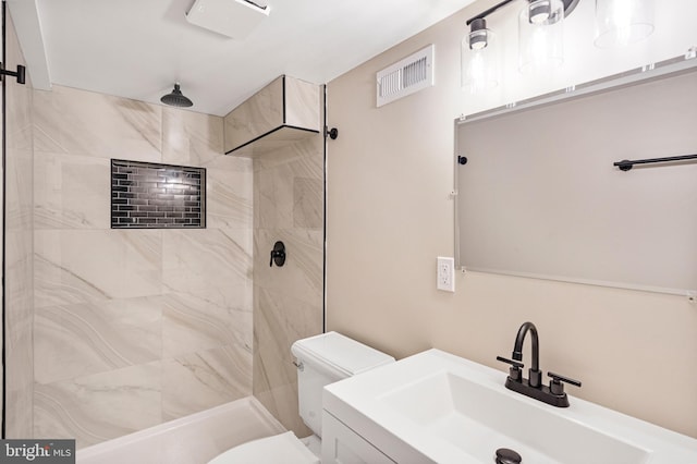 5311 Herring Run Dr, Baltimore, MD 21214 - full bathroom featuring toilet, tiled shower, and vanity