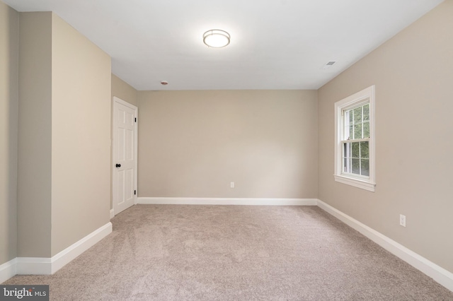 5311 Herring Run Dr, Baltimore, MD 21214 - empty room featuring light colored carpet and baseboards