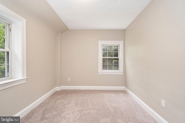 5311 Herring Run Dr, Baltimore, MD 21214 - carpeted empty room featuring baseboards and vaulted ceiling