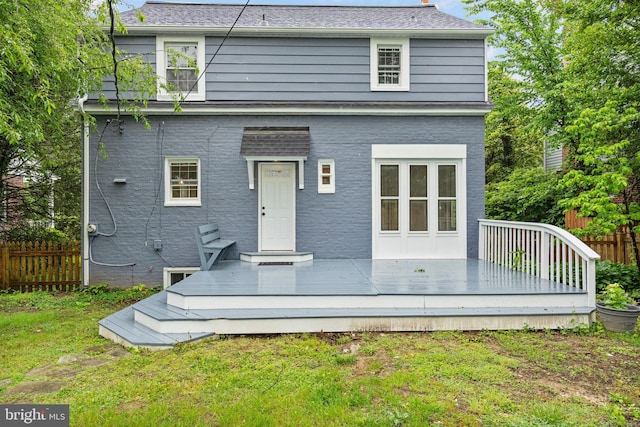 5311 Herring Run Dr, Baltimore, MD 21214 - rear view of property with a wooden deck and a chimney