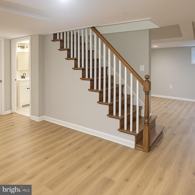 5311 Herring Run Dr, Baltimore, MD 21214 - stairs featuring wood finished floors and baseboards