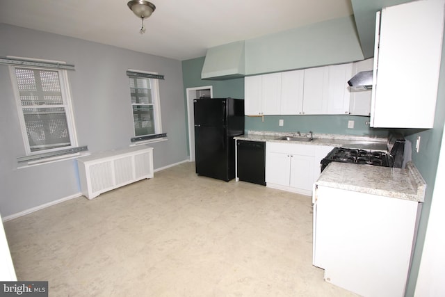 kitchen featuring black appliances, a sink, white cabinetry, wall chimney range hood, and baseboards