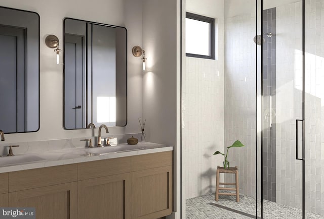 full bath featuring a stall shower and double vanity