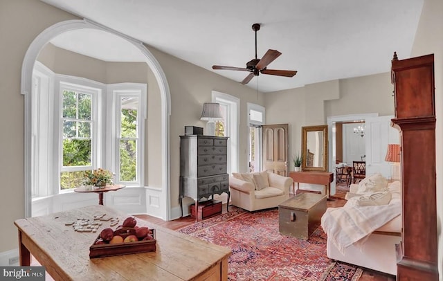 612 Old Rte 322, Spring Mills, PA 16875 - living room with plenty of natural light, arched walkways, and ceiling fan