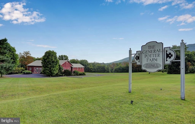 612 Old Rte 322, Spring Mills, PA 16875 - surrounding community featuring a lawn and a mountain view
