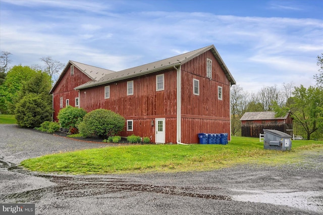 612 Old Rte 322, Spring Mills, PA 16875 - view of side of home with metal roof