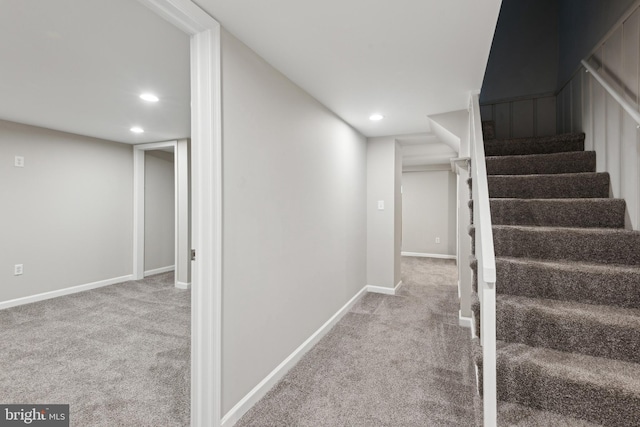 stairs featuring carpet, recessed lighting, and baseboards